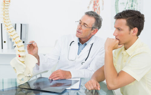 Winnipeg Chiropractor explaining the spine to patient